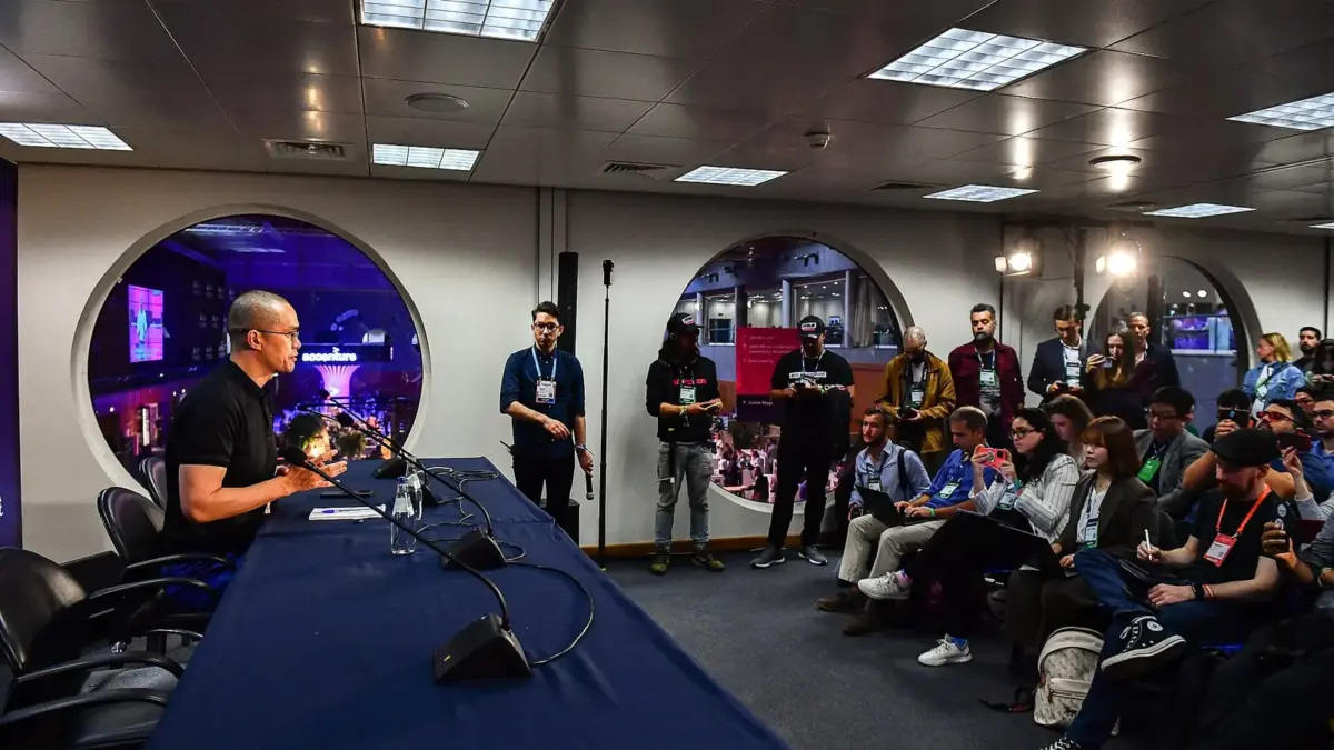 Changpeng Zhao speaking at a press conference at Web Summit 2022